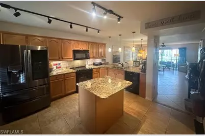 120 Pebble Shores Dr #106, Naples, FL 34110 - Photo 2