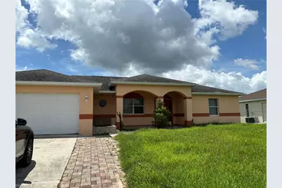 546 Long Island St E, Lehigh Acres, FL 33974 - Photo 1