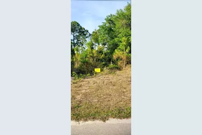 961 Iris St E, Lehigh Acres, FL 33974 - Photo 1