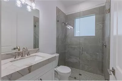 3074 Pine Tree Dr, Naples, FL 34112 - Photo 12