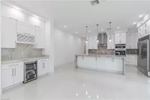 3074 Pine Tree Dr, Naples, FL 34112 - Photo 6