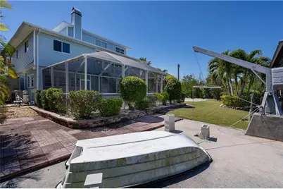7940 Lobean Ln, Bokeelia, FL 33922 - Photo 12