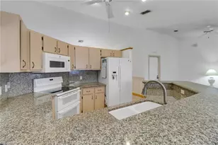 2378 River Reach Dr, Naples, FL 34104 - Photo 4