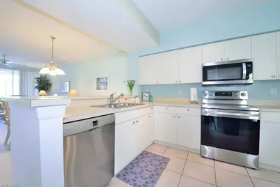 4960 Deerfield Way #E102, Naples, FL 34110 - Photo 8