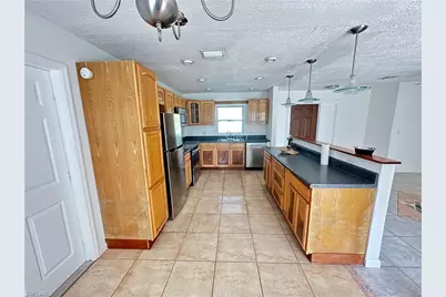 25 Estate Dr, North Fort Myers, FL 33917 - Photo 6