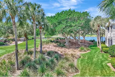 9041 Whimbrel Watch Ln #201, Naples, FL 34109 - Photo 1