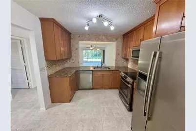 661 Squire Cir #101, Naples, FL 34104 - Photo 4