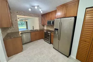 661 Squire Cir, Naples, FL 34104 - Photo 2