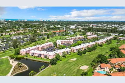 180 Turtle Lake Ct #206, Naples, FL 34105 - Photo 1