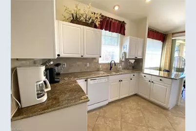 1570 Winding Oaks Way #201, Naples, FL 34109 - Photo 12