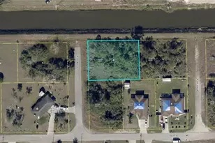 704 Brian Ave N, Lehigh Acres, FL 33971 - Photo 1