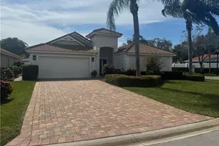 1595 Whispering Oaks Cir, Naples, FL 34110 - Photo 2