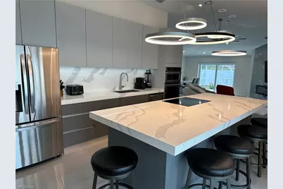 1595 Whispering Oaks Cir, Naples, FL 34110 - Photo 4