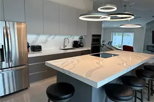 1595 Whispering Oaks Cir, Naples, FL 34110 - Photo 4