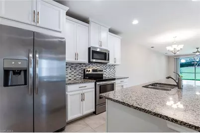 14533 Edgewater Cir, Naples, FL 34114 - Photo 8