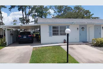 19 Pinewood Blvd, Lehigh Acres, FL 33936 - Photo 1