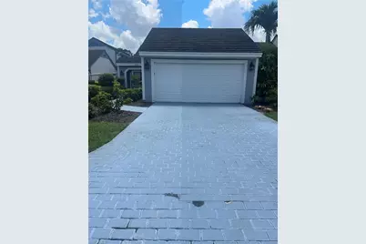 11735 Quail Village Way, Naples, FL 34119 - Photo 2