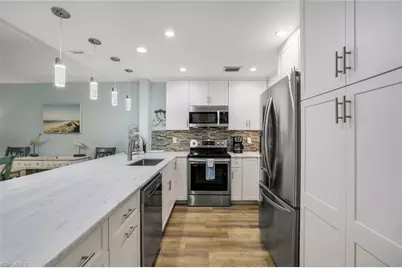 9101 Vanderbilt Dr #1-302, Naples, FL 34108 - Photo 8