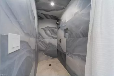 1300 Hilltop Dr, Naples, FL 34103 - Photo 32