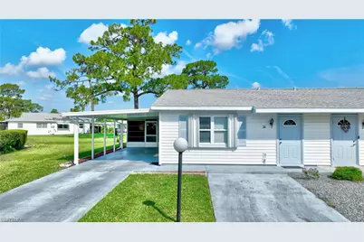26 Pinewood Blvd, Lehigh Acres, FL 33936 - Photo 1