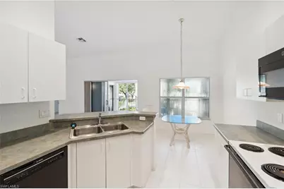 24797 Lakemont Cove Ln #202, Bonita Springs, FL 34134 - Photo 4