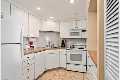 3 Bluebill Ave #610, Naples, FL 34108 - Photo 6