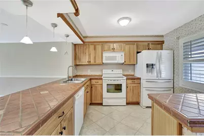 1051 Foxfire Ln #309, Naples, FL 34104 - Photo 4