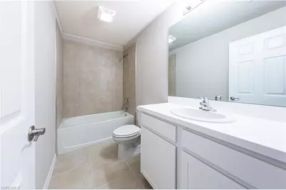 15307 Wildflower Cir, Naples, FL 34119 - Photo 10