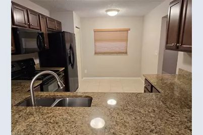 605 Squire Cir #203, Naples, FL 34104 - Photo 10