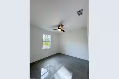 842 Giorgio Ave S, Lehigh Acres, FL 33974 - Photo 20