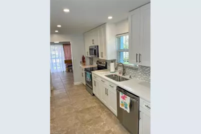 6371 Pelican Bay Blvd #1N, Naples, FL 34108 - Photo 2