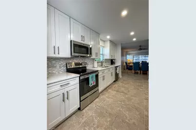 6371 Pelican Bay Blvd #1N, Naples, FL 34108 - Photo 4