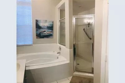 25240 Pelican Creek Cir #202, Bonita Springs, FL 34134 - Photo 18