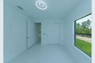 719 Almelia St E, Lehigh Acres, FL 33974 - Photo 48