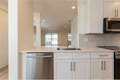 15618 Summit Place Cir #396, Naples, FL 34119 - Photo 4