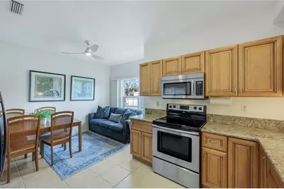 437 Wiggins Lake Ct #201, Naples, FL 34110 - Photo 6