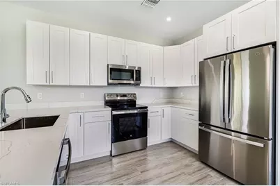 1909 Moore Ave, Lehigh Acres, FL 33972 - Photo 4