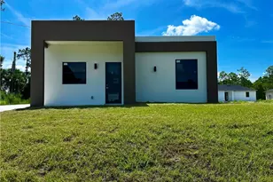 323 Mangonia Ave, Lehigh Acres, FL 33974 - Photo 1