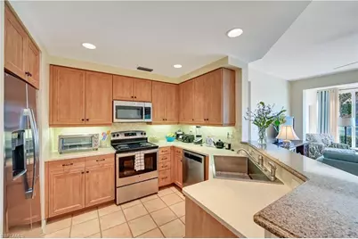 1051 Egrets Walk Cir #7-102, Naples, FL 34108 - Photo 6