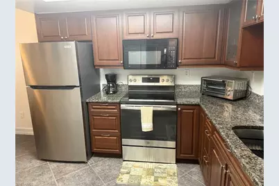 5535 Rattlesnake Hammock #104, Naples, FL 34113 - Photo 2