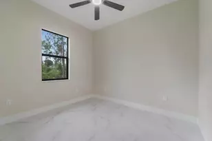 915 Anthony St E, Lehigh Acres, FL 33974 - Photo 20