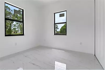 2911 28th St SW, Lehigh Acres, FL 33976 - Photo 10