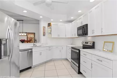 7048 Pelican Bay Blvd #C-105, Naples, FL 34108 - Photo 6