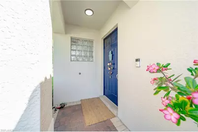 1638 Triangle Palm Ter, Naples, FL 34119 - Photo 2