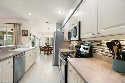 2329 Heritage Greens Dr, Naples, FL 34119 - Photo 10