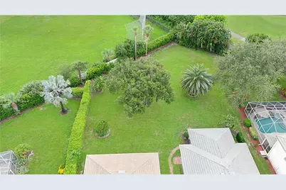 2329 Heritage Greens Dr, Naples, FL 34119 - Photo 20