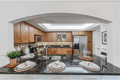 5633 Turtle Bay Dr #37, Naples, FL 34108 - Photo 2