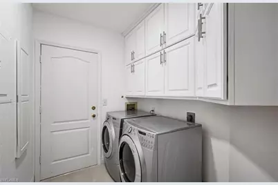 7056 Pelican Bay Blvd #B102, Naples, FL 34108 - Photo 2