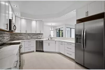 7056 Pelican Bay Blvd #B102, Naples, FL 34108 - Photo 12