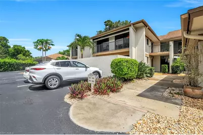 576 Retreat Dr #201, Naples, FL 34110 - Photo 1